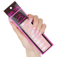 Faux ongles à presser en ABS, forme cercueil longue, avec motifs French Manucure, cœurs blancs scintillants, couleur nude, pour la Saint-Valentin