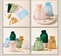 Nouveauté en promotion : Sacs cadeaux en organza scintillant avec cordon de serrage, sacs d'emballage cosmétiques personnalisés en organza avec ruban pour cadeaux