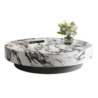 Table basse légère en marbre blanc de style italien minimaliste et haut de gamme à usage domestique pour le salon