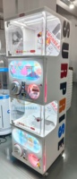 Máquina expendedora de cápsulas Gacha de doble piso metálica personalizable Wangerbao operada con monedas para premios de garra