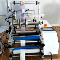 Vente à chaud imprimante de code de date manuelle semi-automatique machine d'étiquetage de bouteilles rondes d'eau en verre plastique PET autocollant