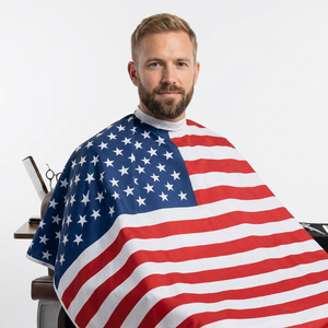 Cape de coiffure imperméable en polyester confortable pour hommes, femmes et enfants, écologique, durable et résistante aux taches - Product Image 1