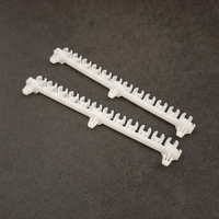 Pièces de machine d'injection de support en nylon en plastique blanc