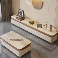 Table basse de style vintage en noyer avec plateau en travertin, idéale pour les petits appartements, design simple et moderne.