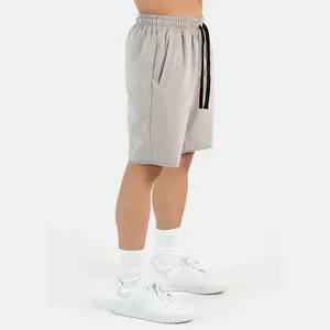 Grosir celana pendek pria spandeks katun kantong samping Hem polos esensial tali pinggang elastis Logo cetak desainer modis