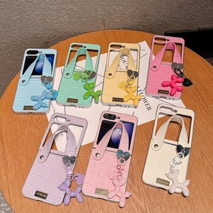 เคสหนังจระเข้สายรัดจับสุดหรูสำหรับ <span class=keywords><strong>Samsung</strong></span> Galaxy Z <span class=keywords><strong>flip</strong></span> 7 6 4 5 <span class=keywords><strong>3</strong></span>-เสน่ห์ของลูกสุนัขสำหรับมือถือ - Product Image 1