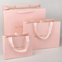 Sac en papier réutilisable avec fermeture à nœud pour les courses, les cadeaux et les bijoux