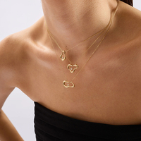 Collier pendentif plaqué or 14 carats Gemnel avec breloque ovale en forme de goutte ouverte, chaîne câble et zircon cubique taille ronde serti clos, style minimaliste