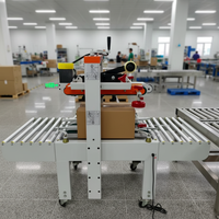 Machine de scellage de rubans semi-automatique à réglage manuel de la largeur, pour le conditionnement de petites lots