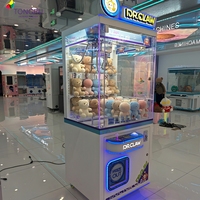 Machine à cadeaux en peluche commerciale à monnayeur avec garantie d'un an, code QR et griffe métallique pour jeu de poussée de pièces