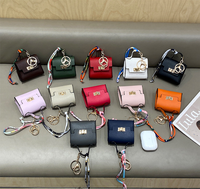 Nouveau porte-monnaie en cuir PU, mini sac à lanière pour rouge à lèvres, écouteurs, clés de voiture, porte-clés en cuir