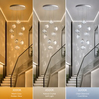 Lustre moderne en cristal en spirale, luminaire suspendu pour longue escalier, idéal pour villa à plafond haut ou salon duplex