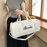 Nouvel arrivage de bagages en toile avec logo personnalisé sacs de voyage grande capacité sac de sport personnalisé sac de sport sac de sport pour entraînement week-end
