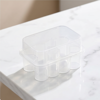 Boîte de rangement transparente en PP, adaptée au stockage et à la distribution de divers liquides, poudres ou huiles.