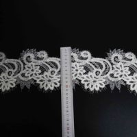 Nouvelle dentelle brodée en acrylique et polyester avec motifs floraux en relief pour robes de mariée et manches de chemisiers