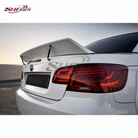 Kit carrosserie large Rocket Bunny pour BMW M3 E92 E93, comprenant pare-chocs avant, spoiler, ailes et aileron arrière en fibre de verre.