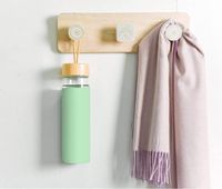 Botol Air Kaca Borosilikat Yomious 20 Oz dengan Tutup Bambu dan Selubung Silikon Bebas BPA