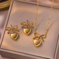 Boucles d'oreilles pendantes en forme de cœur en plaqué or 18 carats, ensemble de bijoux en acier inoxydable, cadeau de mariage, boucles d'oreilles à nœud fin pour femmes