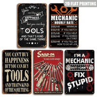No puedes comprar la felicidad, pero puedes comprar herramientas: letreros rústicos de metal