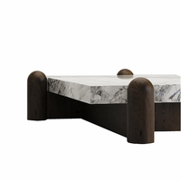 Table basse de luxe moderne en marbre blanc et bois foncé avec pieds arrondis pour salon