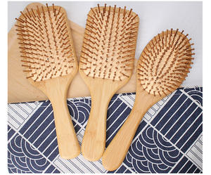 Cepillo de pelo de madera de bambú con cojín de aire con logotipo personalizado para mujer, peine para desenredar piojos con características de comodidad - Product Image 1