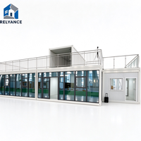 Maison conteneur pliable RELYANCE 40 pieds – Économisez sur les frais de transport – Panneaux muraux isolés – Dortoir pour travailleurs avec terrasse au deuxième étage