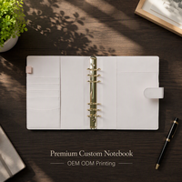 Carnet personnalisé A5, couverture rigide en cuir, classeur à feuilles mobiles avec porte-stylo et porte-cartes, pour étudiants et professionnels.