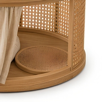 Table basse ronde en bois et rotin tressé avec niche pour chat, idéale pour le salon, conçue pour une utilisation partagée entre les humains et les animaux domestiques