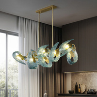 Lustre en verre moderne et minimaliste pour hôtel, lampe suspendue intérieure en verre personnalisée pour salon, lustre en verre artistique bleu en forme de fleur