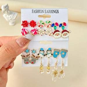 Navidad copo de nieve <span class=keywords><strong>Santa</strong></span> Claus Stud pendientes lindo dibujos animados mariposa diseño fiesta aleación aceite gota pingüino Reno - Product Image 1