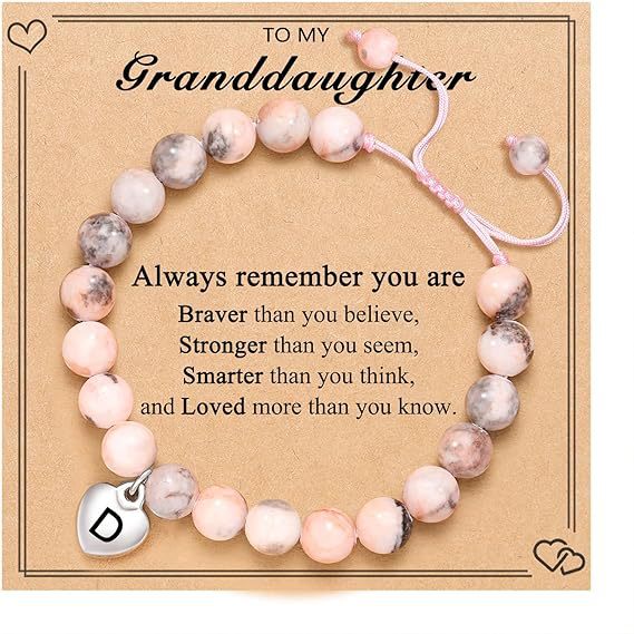 Pulsera rosa tejida con cebra y letra d