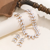 Ensemble de bijoux élégant de style feuille de luxe, collier et boucles d'oreilles, pour le quotidien et les soirées, bijoux de boutique
