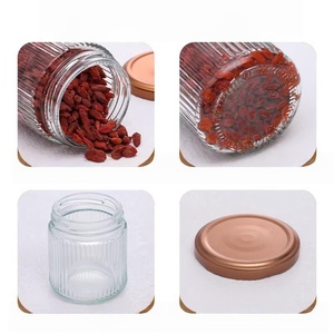 Vente en gros Bouteille en verre pour pouding nid d'oiseau Bocal en verre pour le stockage des aliments à rayures verticales avec bouchon en métal - Product Image 3