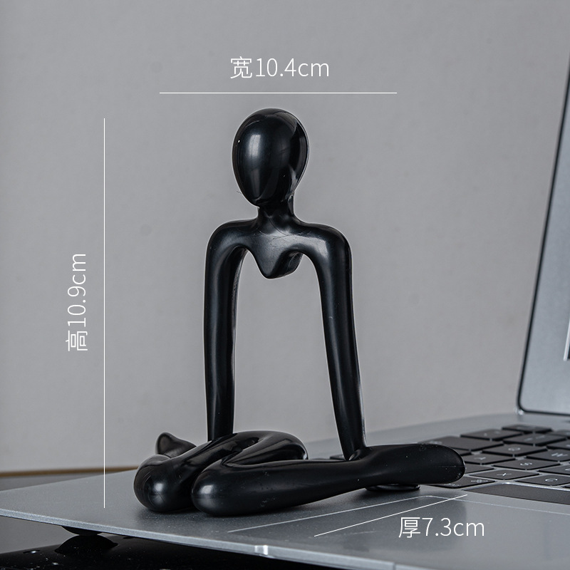 Figurine abstraite noire