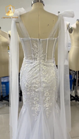 Robe de mariée sirène moderne ZB5839 avec décolleté plongeant, dos nu, cape transparente, bretelles, broderies florales, dentelle florale 3D et tulle, traîne chapelle