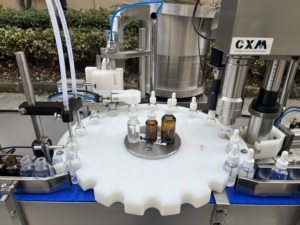 Machine automatique de remplissage et de bouchage de flacons compte-gouttes en verre PLC pour huile/jus/alcool 10-200 ml haute précision - Product Image 3