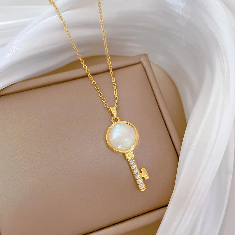 Cadena de acero de titanio + colgante de cobre con incrustaciones de micro