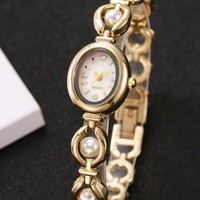 Montre Femme Lumière Marque De Luxe Perle Bijoux Cristal Bracelet Femme Mode Bracelet Quartz Horloge Montres