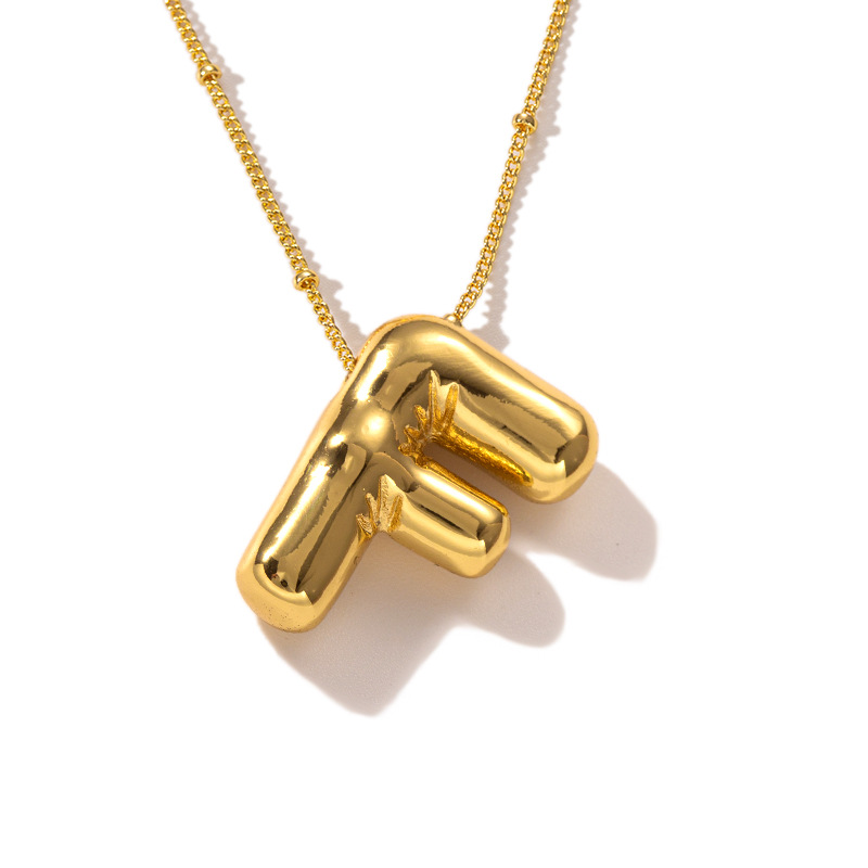 Gold F necklace