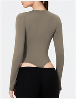 Combinaison de yoga une pièce haut de gamme pour femme, coupe ajustée, manches longues, pour le sport et le fitness, motif uni