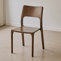 Fauteuil de salle à manger BST Mid Century en noyer avec dossier et assise rembourrés en cuir cognac pour restaurant et hôtel