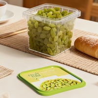 Boîte de 1L (30 onces) de raisins verts secs sans pépins, emballage en plastique avec couvercle, hermétique, empilable et robuste.