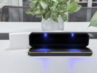 Boîte à bijoux LED noire octogonale à bord doré en gros, boîte à bijoux LED noire pour la vente au détail, boîte à bijoux LED noire octogonale à bord doré en stock