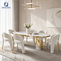 Table de salle à manger ovale de luxe en marbre avec piètement en acier inoxydable doré pour événements et mariages – Fabricant et fournisseur de mobilier pour projets de location, vente en gros