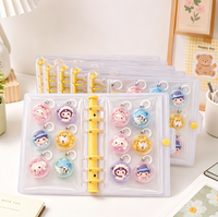 Classeur transparent A6 à 6 anneaux avec couverture à bouton-pression transparente pour le rangement de jouets Squishy, jouets en capsule, photocartes et cartes