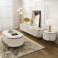 Ensemble de meubles de salon de luxe moderne avec table basse et meuble TV en marbre blanc et pieds en acier inoxydable doré, avec tiroirs, pour hôtel