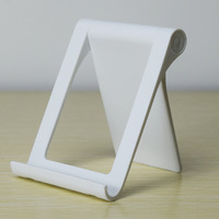 Support de téléphone pliable en gros Support d'accessoires de téléphone portable en PVC et ABS compatible avec l'iPhone et les smartphones pour une utilisation de bureau