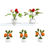 Hotsell wollen haakbloemen mandje gepotte fruit haakgeschenken handgemaakte mini gebreide oranje aardbeienmandje huisdecoratie