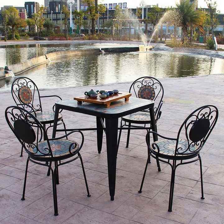 antique iron table and chairs