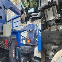 Grue montée sur camion Sinotruk HOWO NX 440 6x4 à flèche droite, très demandée, pour le levage et le transport dans la construction